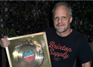 Bassist Mark Evans Auctions AC/DC Gold Record For Sydney Soccer Team